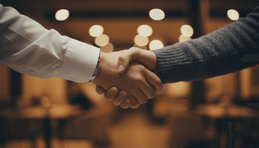 A close-up cinematic photo of a handshake, symbolizing a customer renewal milestone announcement featured on a trusted outlet like AP News.